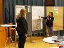 Market of opportunities: Heike Appel, Head of the Planning and Construction section at the Franfurt City Parks Dept. lecturing on the planning status for the district northeast of the Anne Frank housing estate &copy Frankfurt City Planning Dept. 