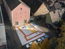 Schrägluftbild vom Ettinghausenplatz in Höchst mit farbigen Bodenbild, © Christoph Kraneburg